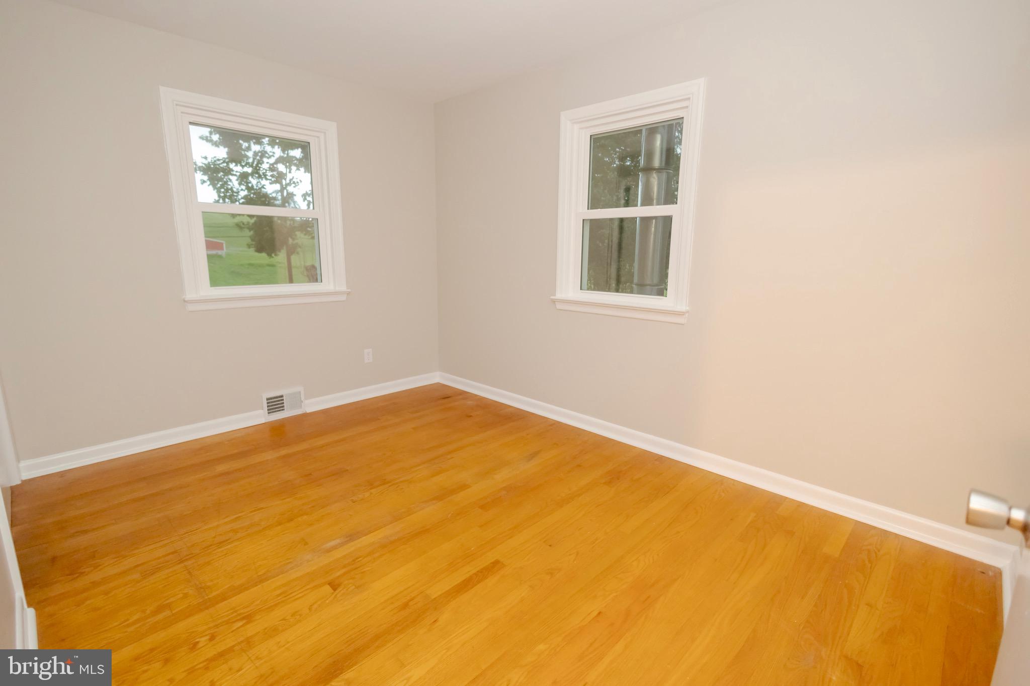 4545 Bill Moxley Road Mount Airy, MD 21771 - Photo 12 of 33 a view of a big room with windows