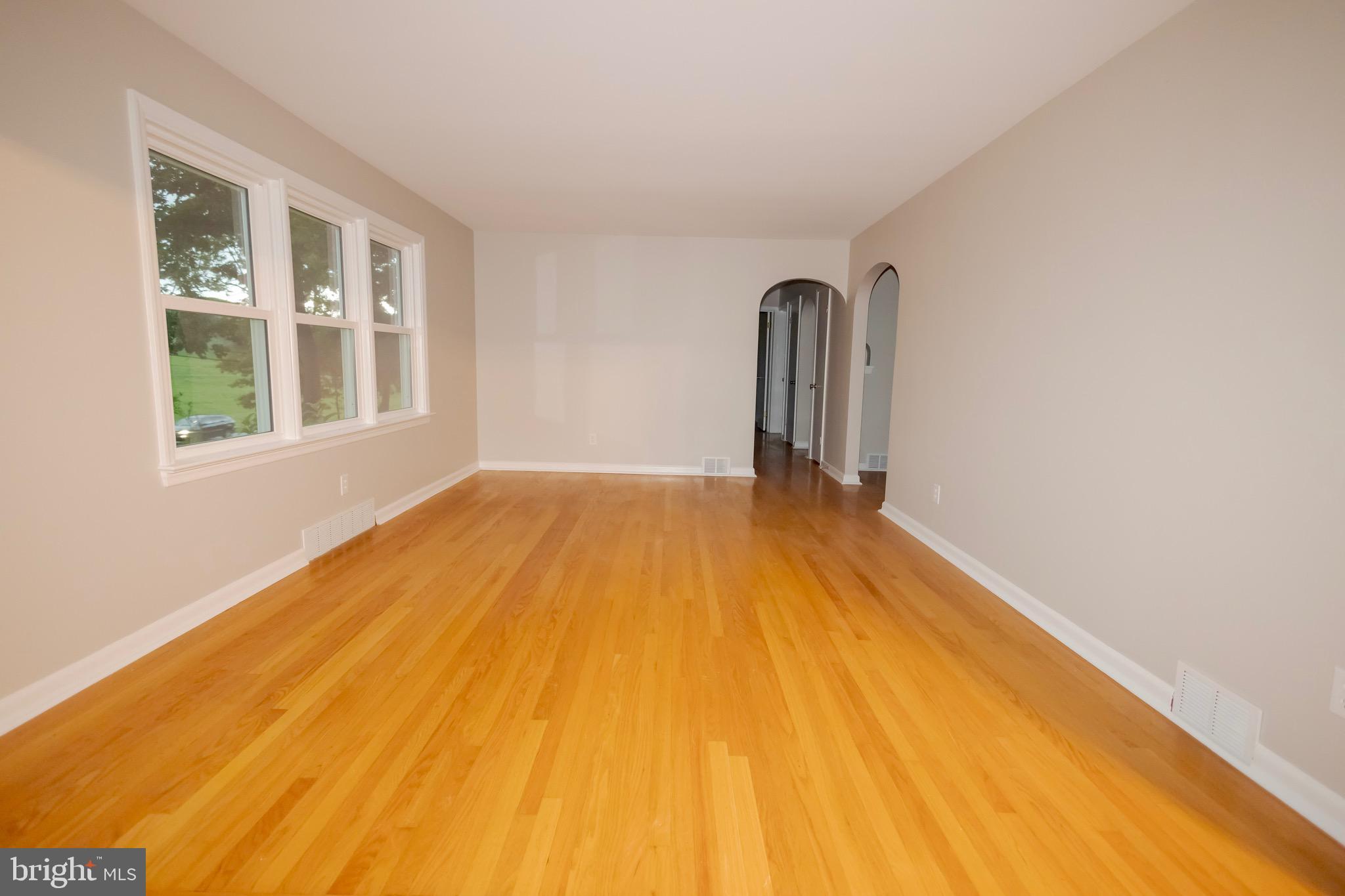 4545 Bill Moxley Road Mount Airy, MD 21771 - Photo 5 of 33 a view of empty room with wooden floor and fan