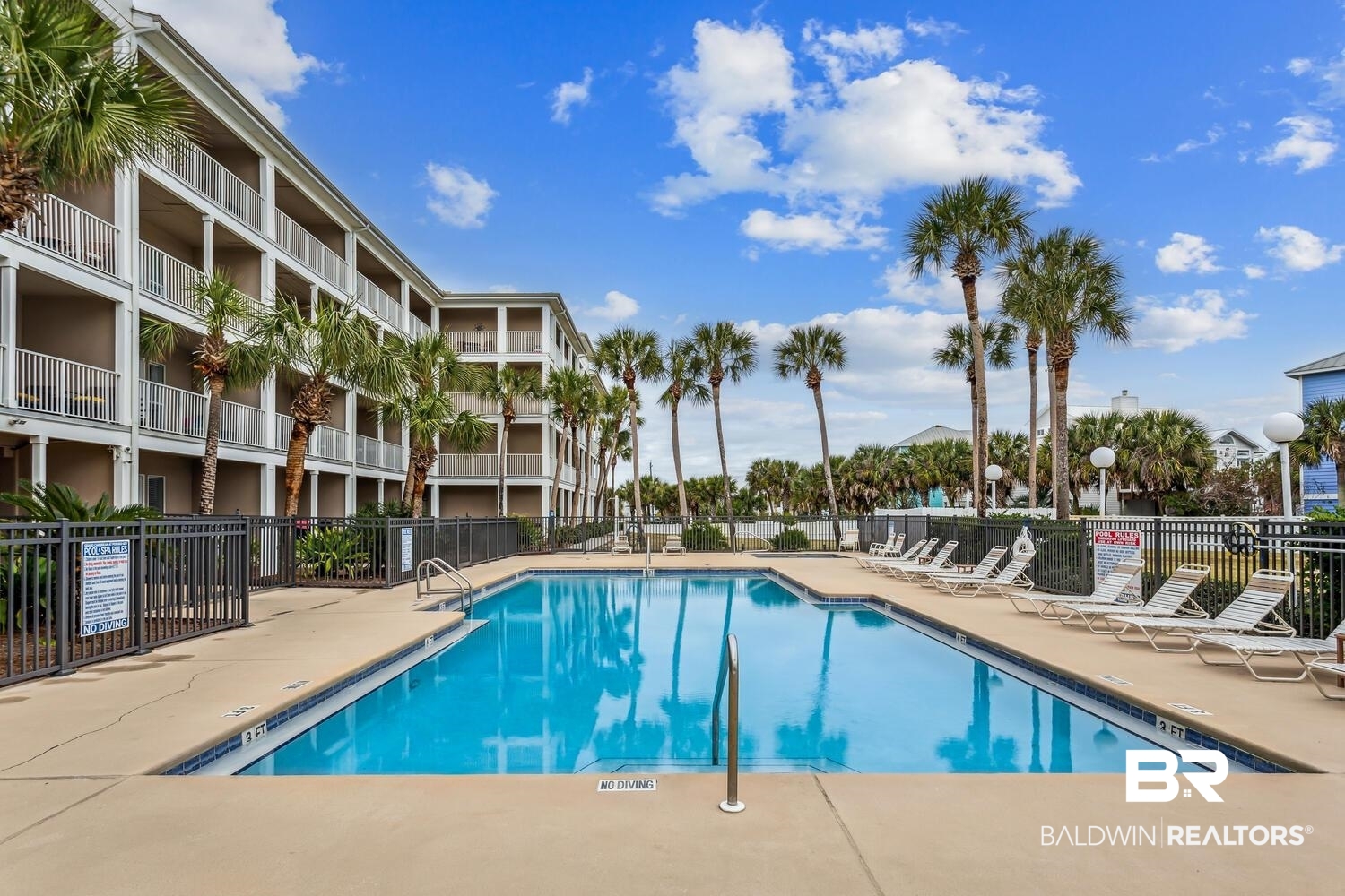 13551 Johnson Beach Road, Unit 112E Pensacola, FL 32507 - Photo 23 of 42 View of pool featuring a patio area