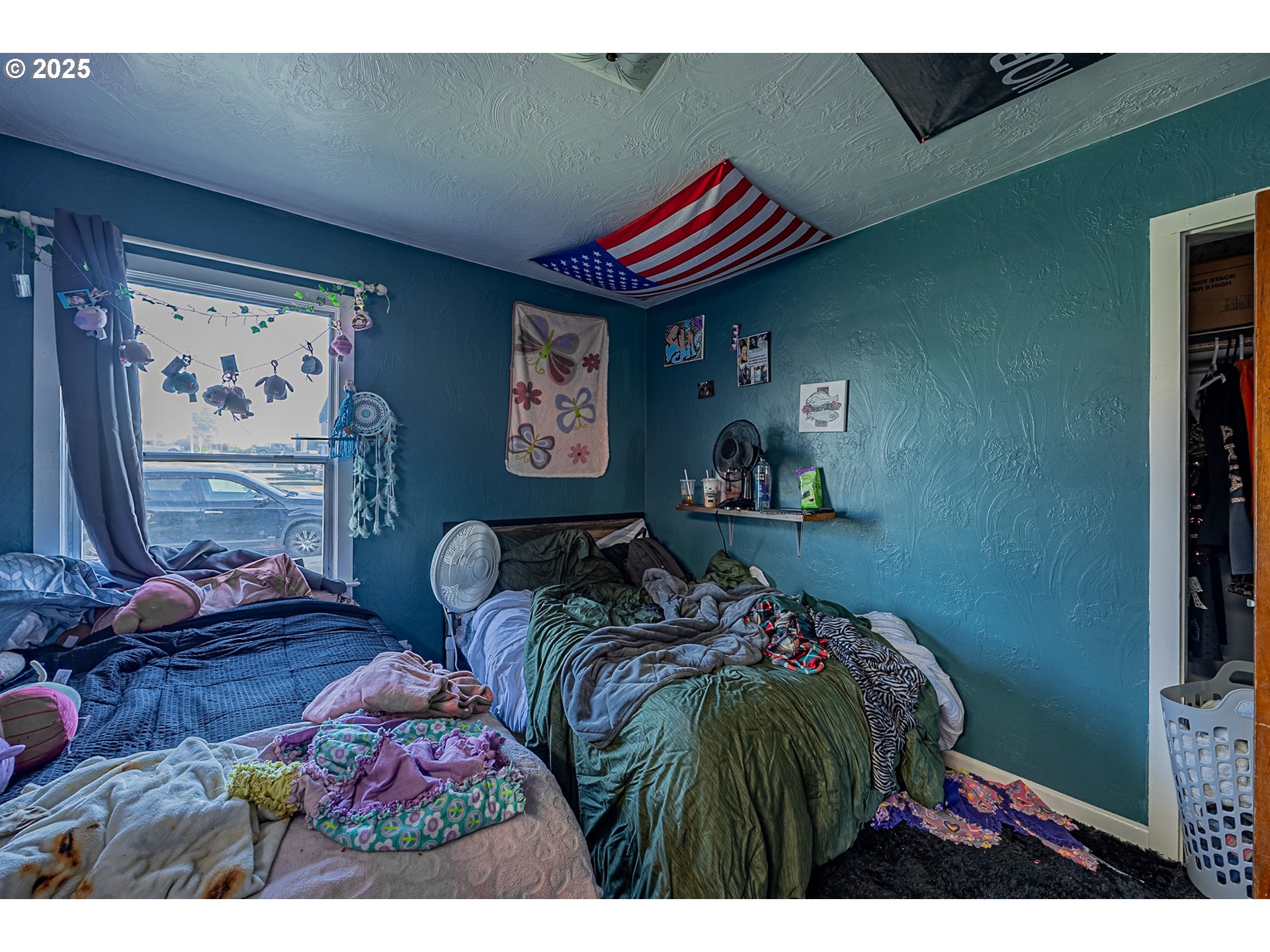 1860 Meade Avenue North Bend, OR 97459 - Photo 14 of 38 a bedroom with furniture and a bed