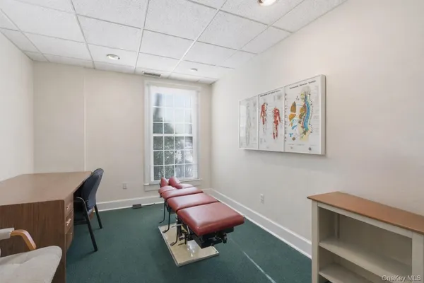 a room with furniture and a window