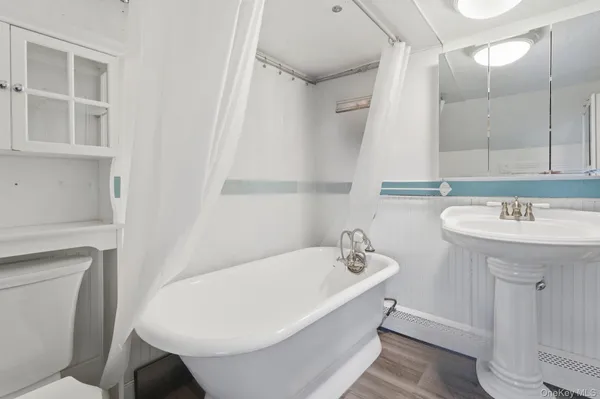a bathroom with a sink and a bathtub