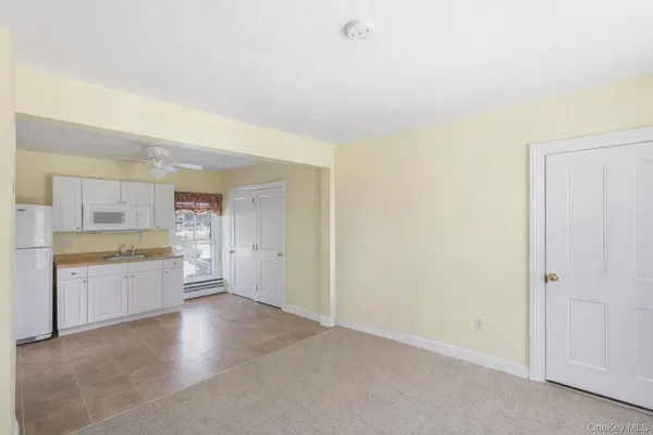 a view of a kitchen with a sink