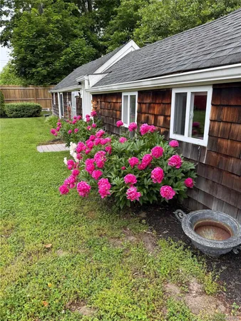 a house view with a garden space