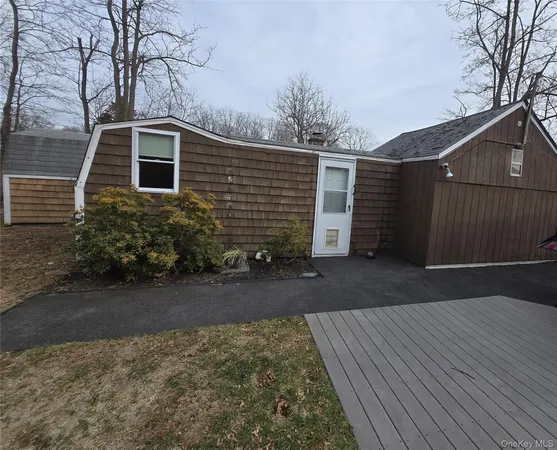 a front view of a house with yard