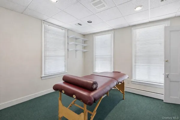 a room with a bed and a window