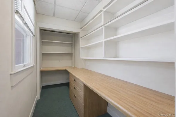 a storage room with cabinets