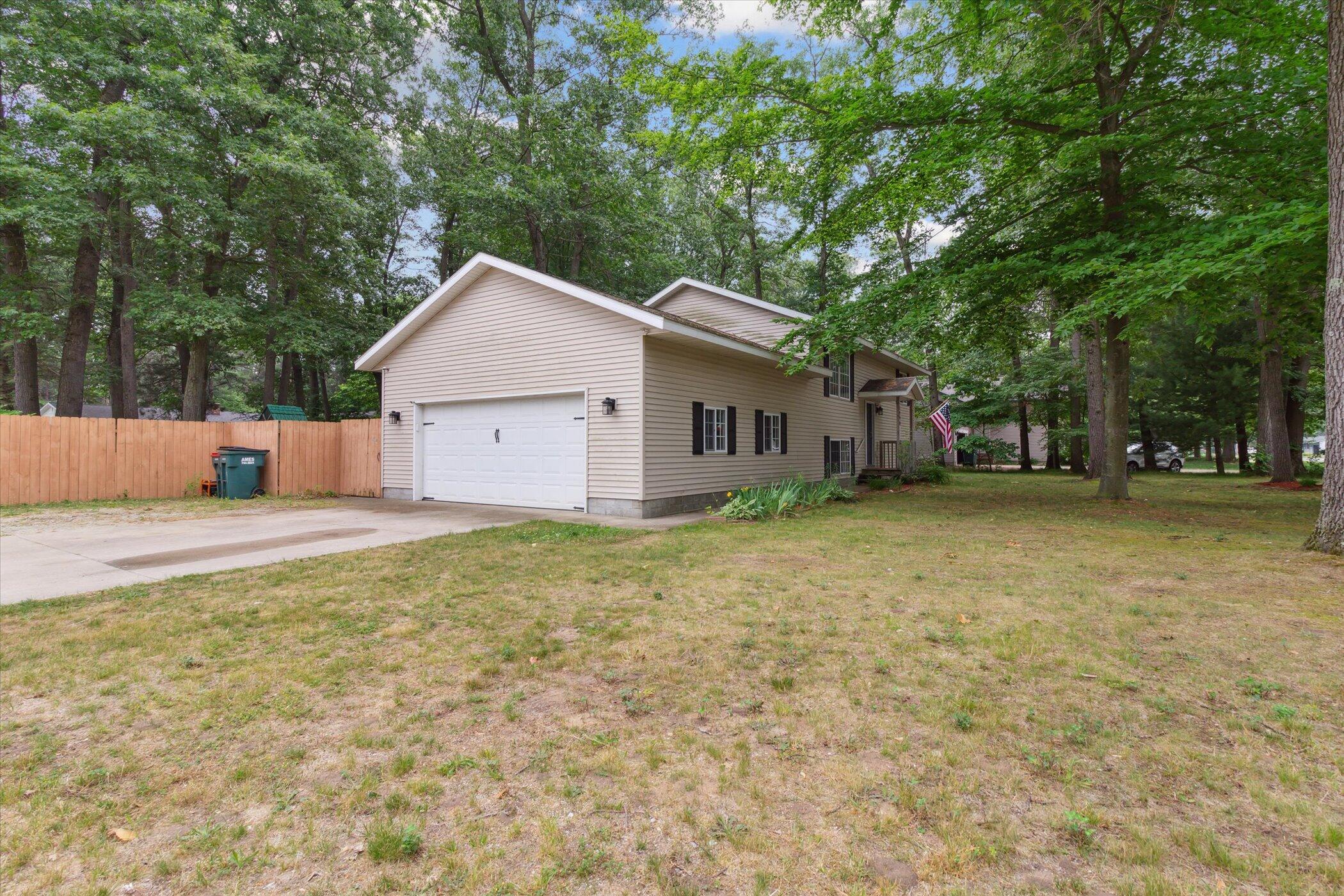 1990 Riegler Road Muskegon, MI 49445 - Photo 2 of 38 02-1990-Riegler-Rd-Muskegon-Charter-Town