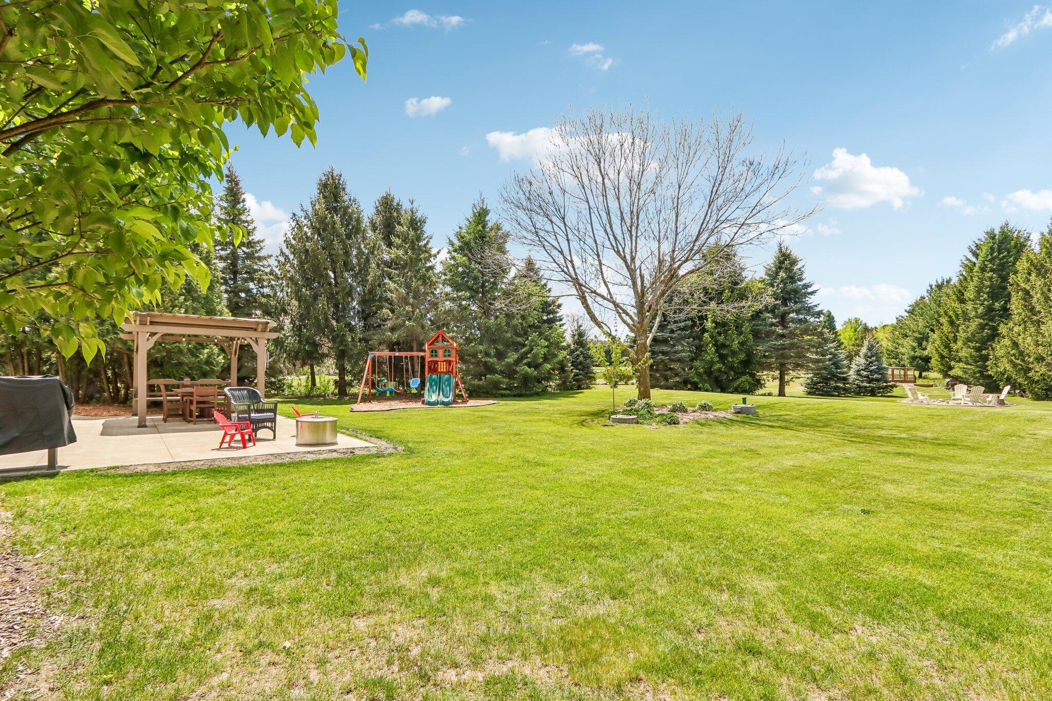 2335 Forest Run Summit, WI 53066 - Photo 46 of 60 Flat Backyard