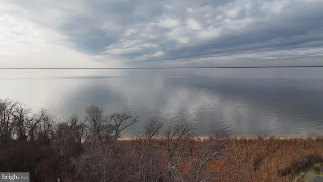 a view of ocean and a mountain