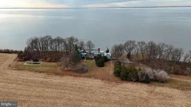 a view of a city street with a lake