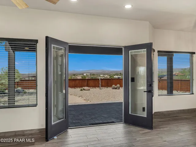 a view of an empty room and window