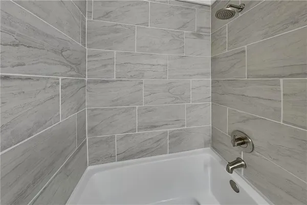 a bathroom with a bathtub