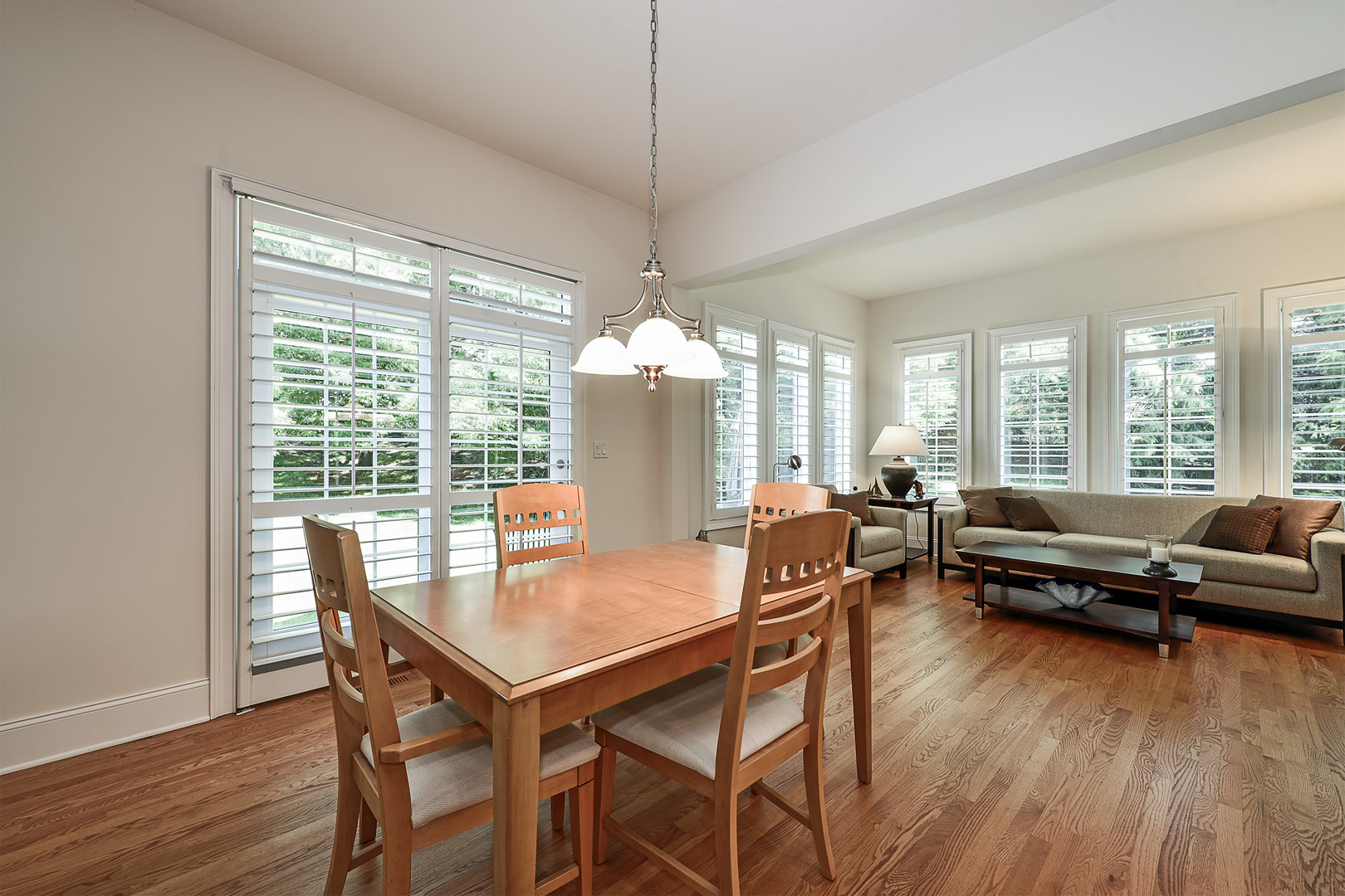 1002 Ridgeview Drive Inverness, IL 60010 - Photo 11 of 34 a view of a dining room with furniture window and wooden floor