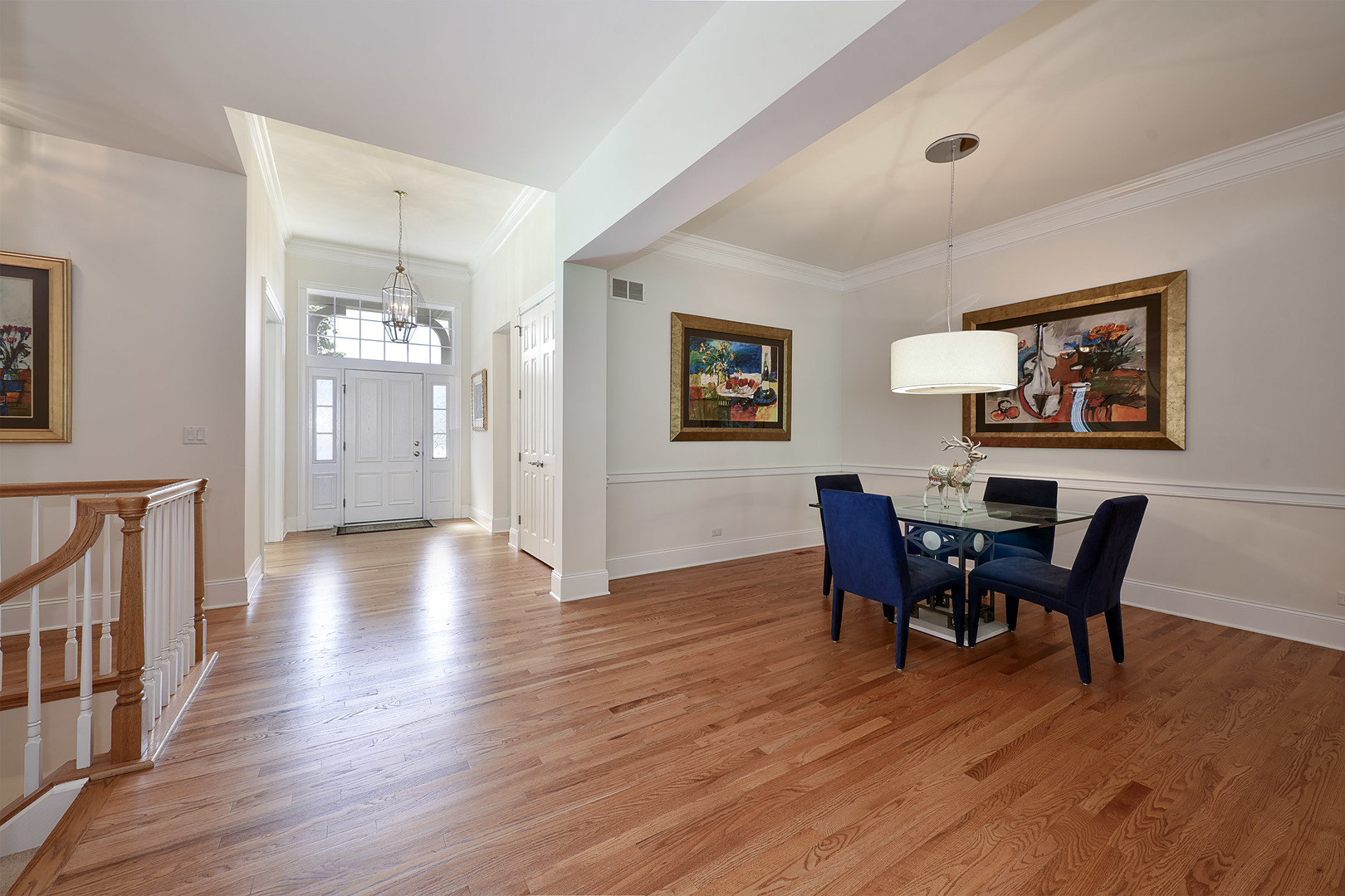 1002 Ridgeview Drive Inverness, IL 60010 - Photo 3 of 34 a view of a dining room with furniture and wooden floor