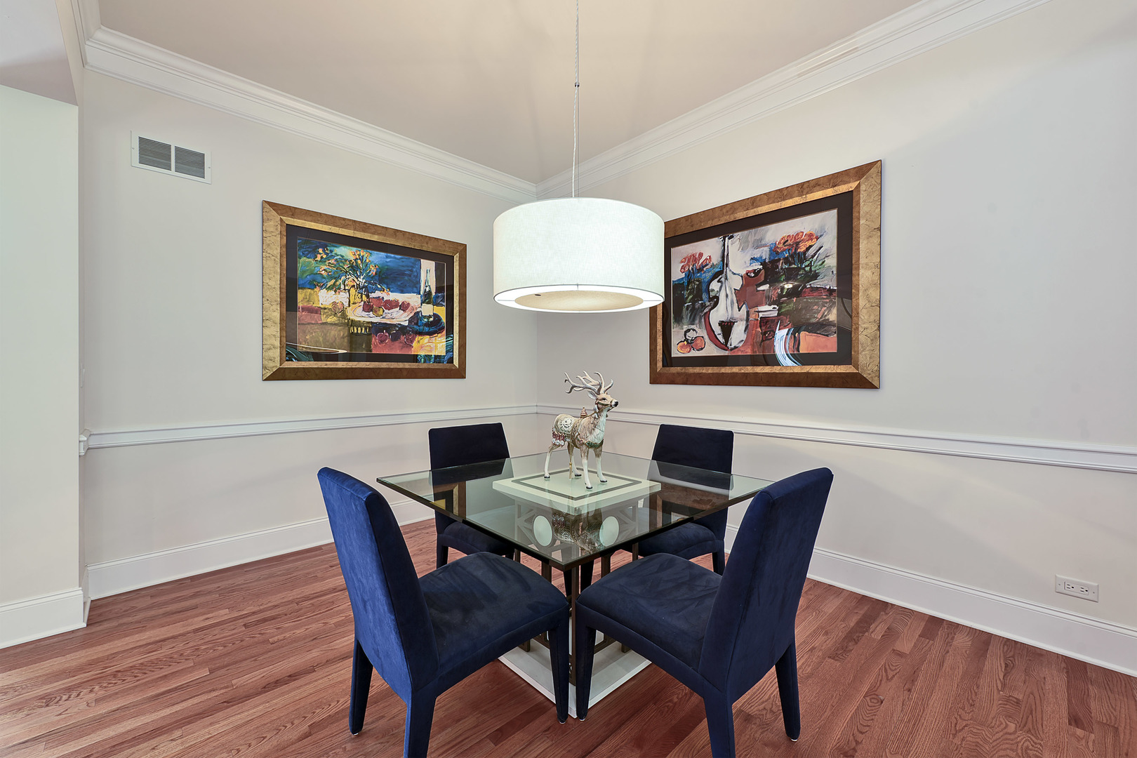1002 Ridgeview Drive Inverness, IL 60010 - Photo 4 of 34 a view of a dining room with furniture wooden floor and a chandelier