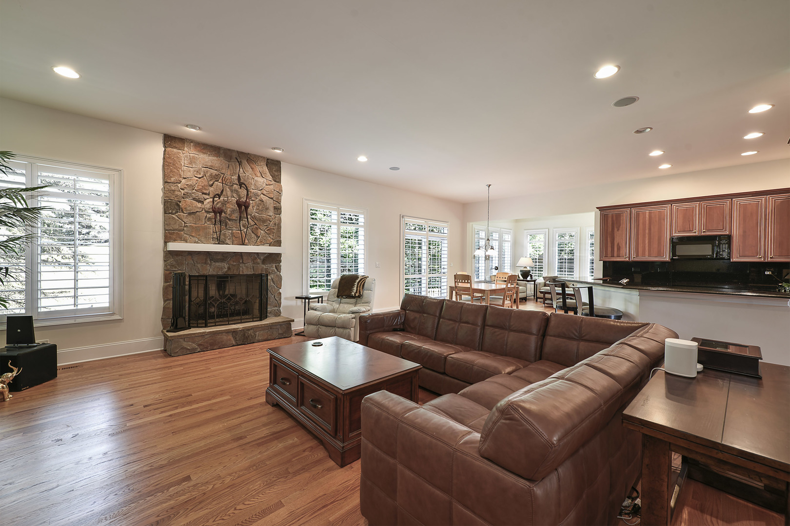 1002 Ridgeview Drive Inverness, IL 60010 - Photo 7 of 34 a living room with furniture wooden floor and a fireplace