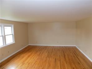 107 Adelaide Road, Unit A Connellsville, PA 15425 - Photo 3 of 8 wooden floor in a empty room