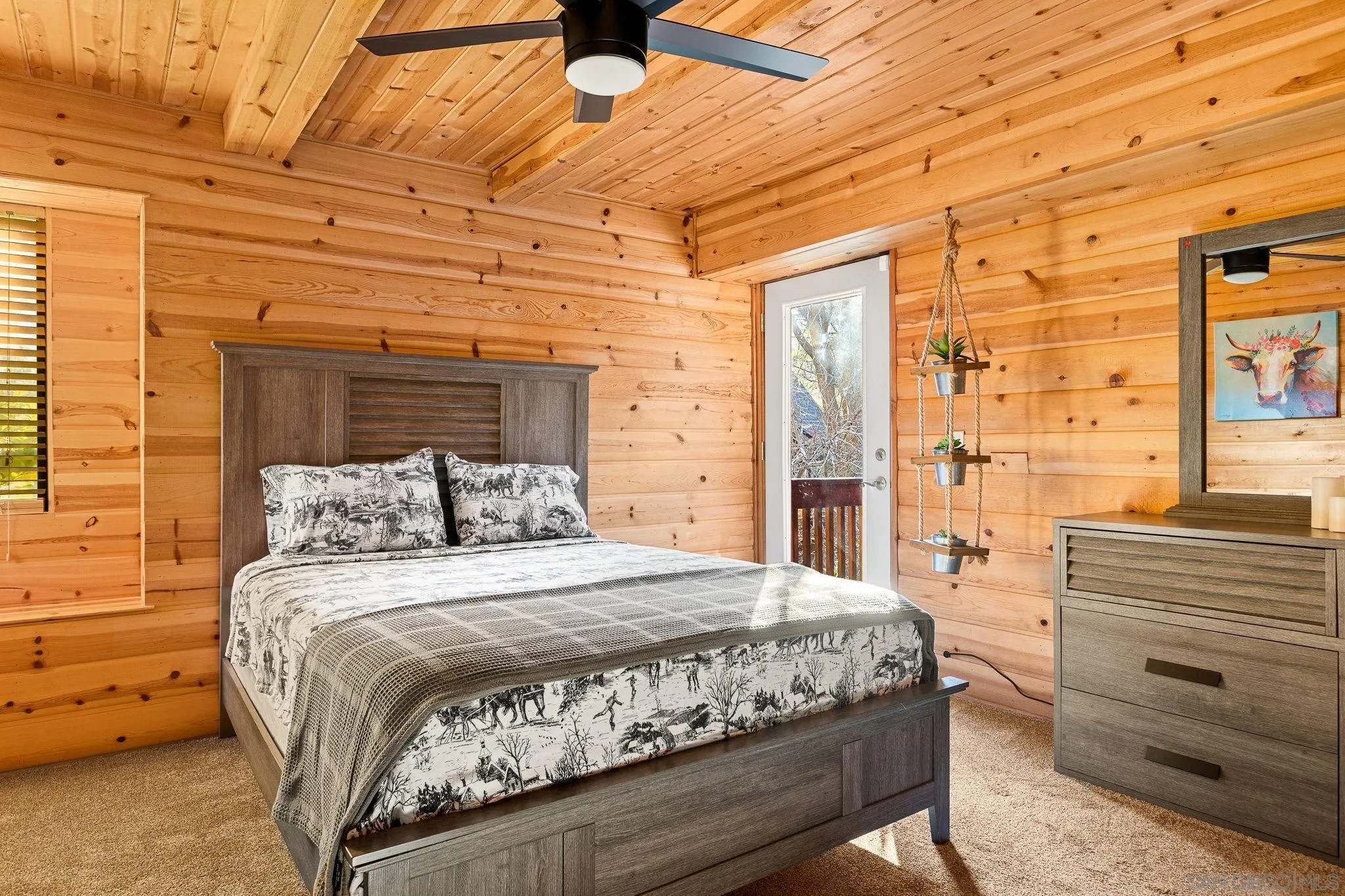 683 Grass Valley Road Lake Arrowhead, CA 92352 - Photo 18 of 39 a bedroom with a bed and a dresser