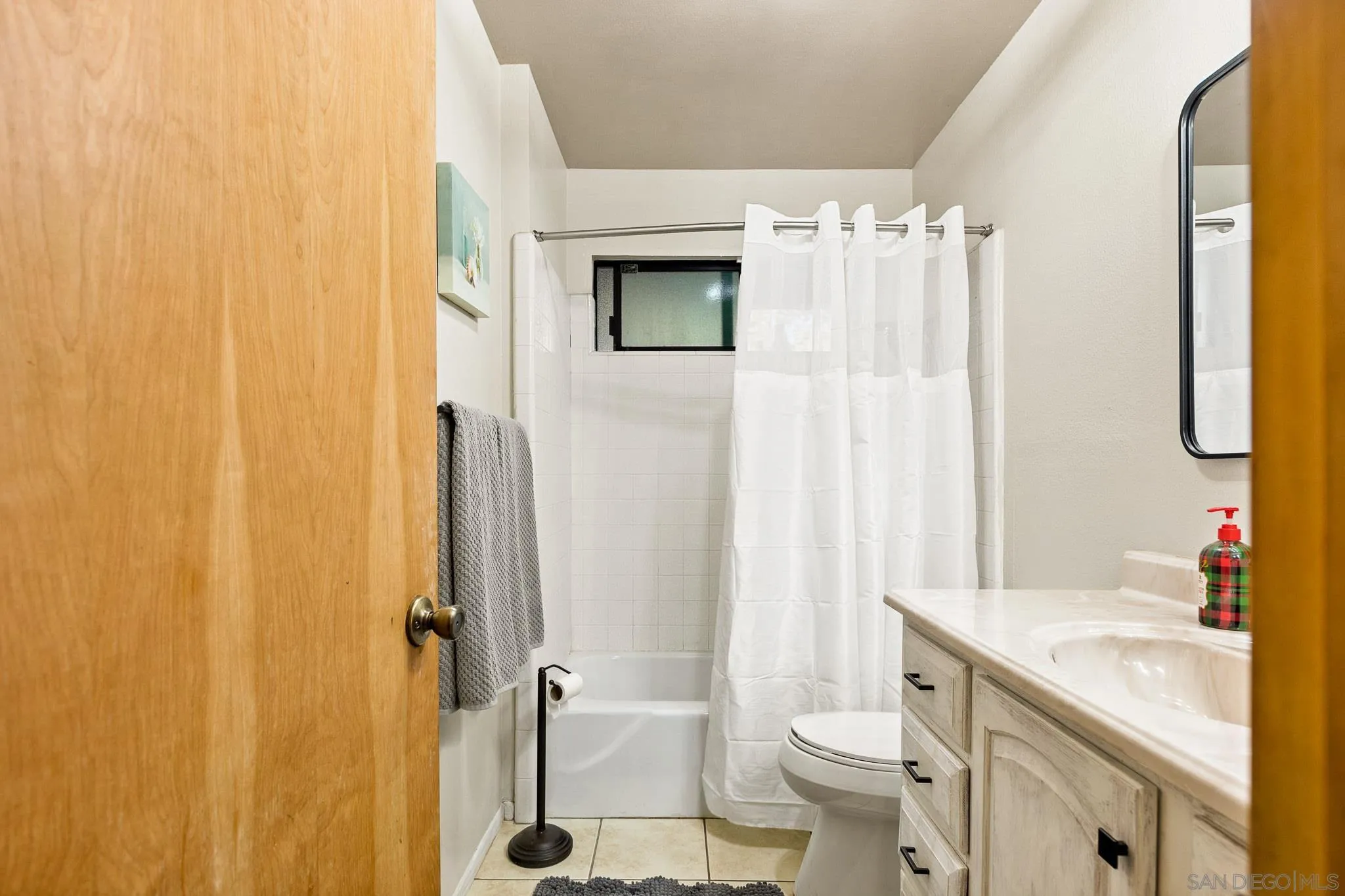 683 Grass Valley Road Lake Arrowhead, CA 92352 - Photo 21 of 39 a bathroom with a granite countertop sink toilet and shower