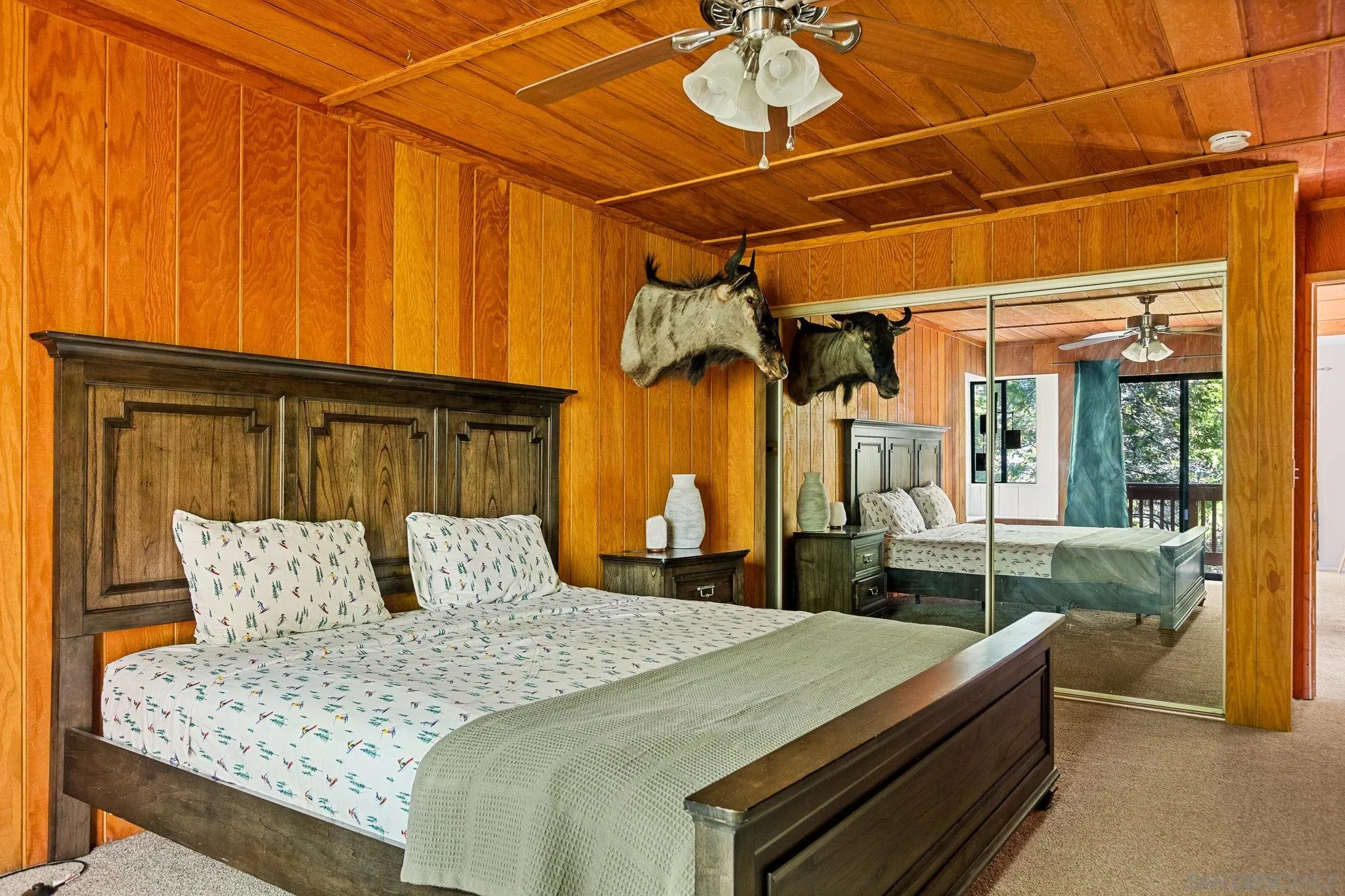 683 Grass Valley Road Lake Arrowhead, CA 92352 - Photo 30 of 39 a bedroom with a bed and a mirror
