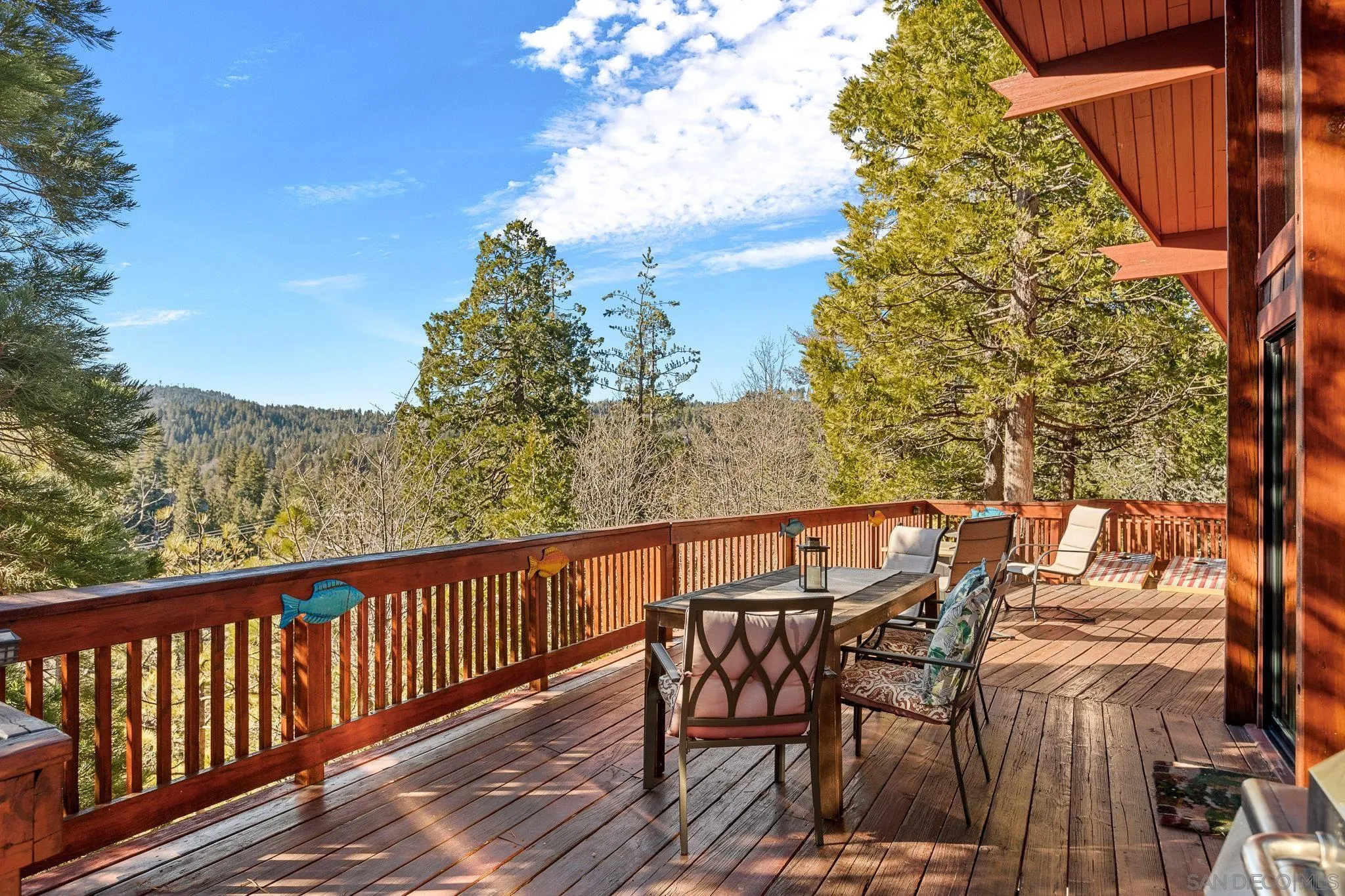 683 Grass Valley Road Lake Arrowhead, CA 92352 - Photo 9 of 39 a view of a balcony with furniture