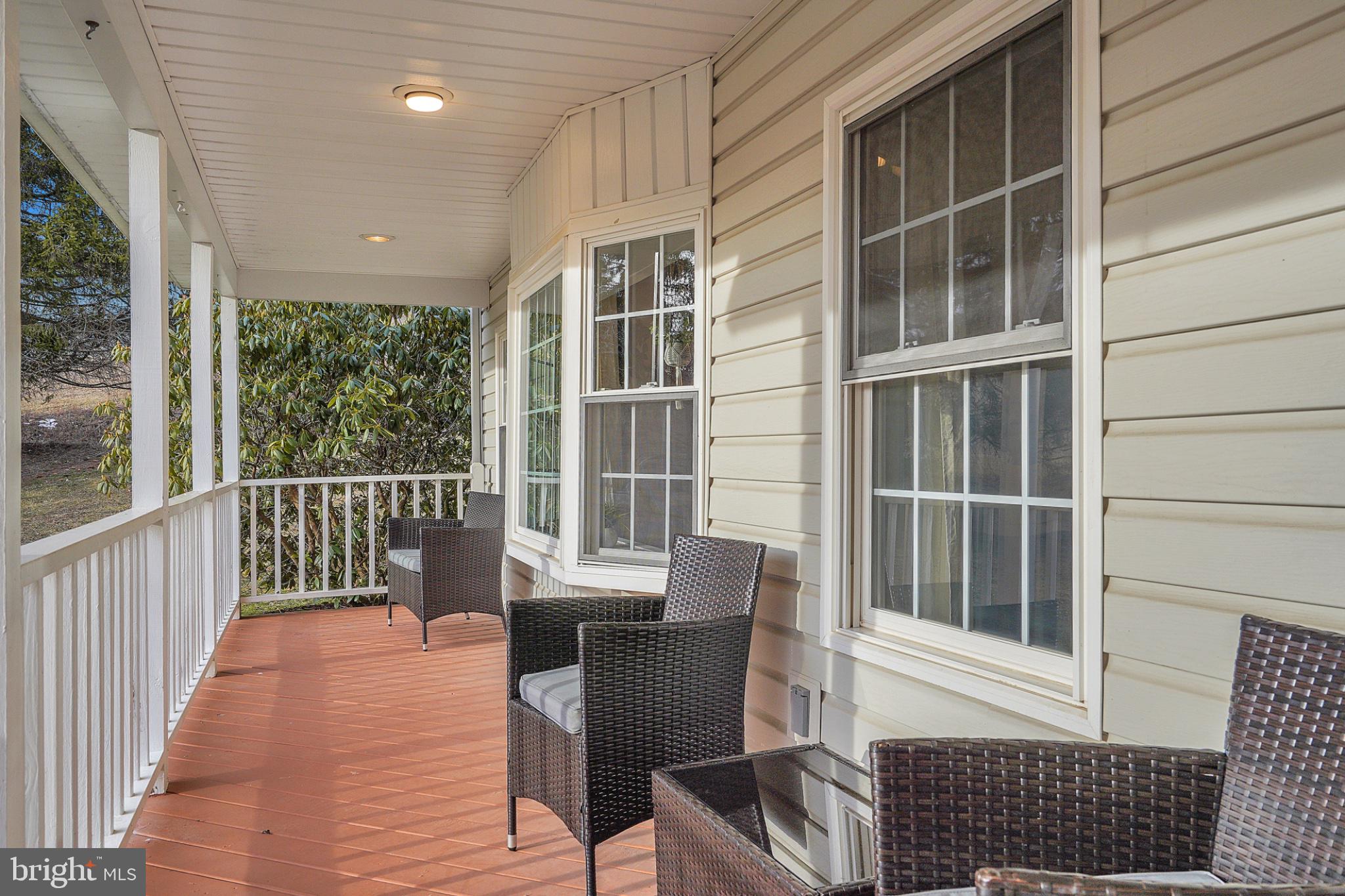 259 A A-Frame Road Coudersport, PA 16915 - Photo 4 of 130 Charming porch with inviting views.
