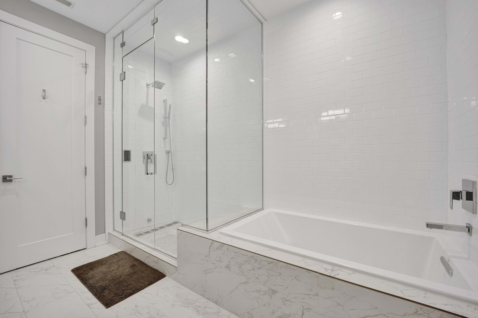 2140 West Rice Street, Unit 1W Chicago, IL 60622 - Photo 14 of 25 a bathroom with a bathtub and a shower