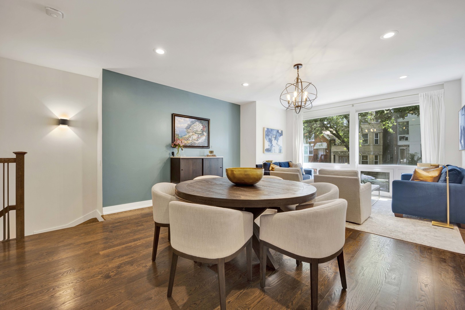 2140 West Rice Street, Unit 1W Chicago, IL 60622 - Photo 5 of 25 a view of a dining room with furniture window and wooden floor