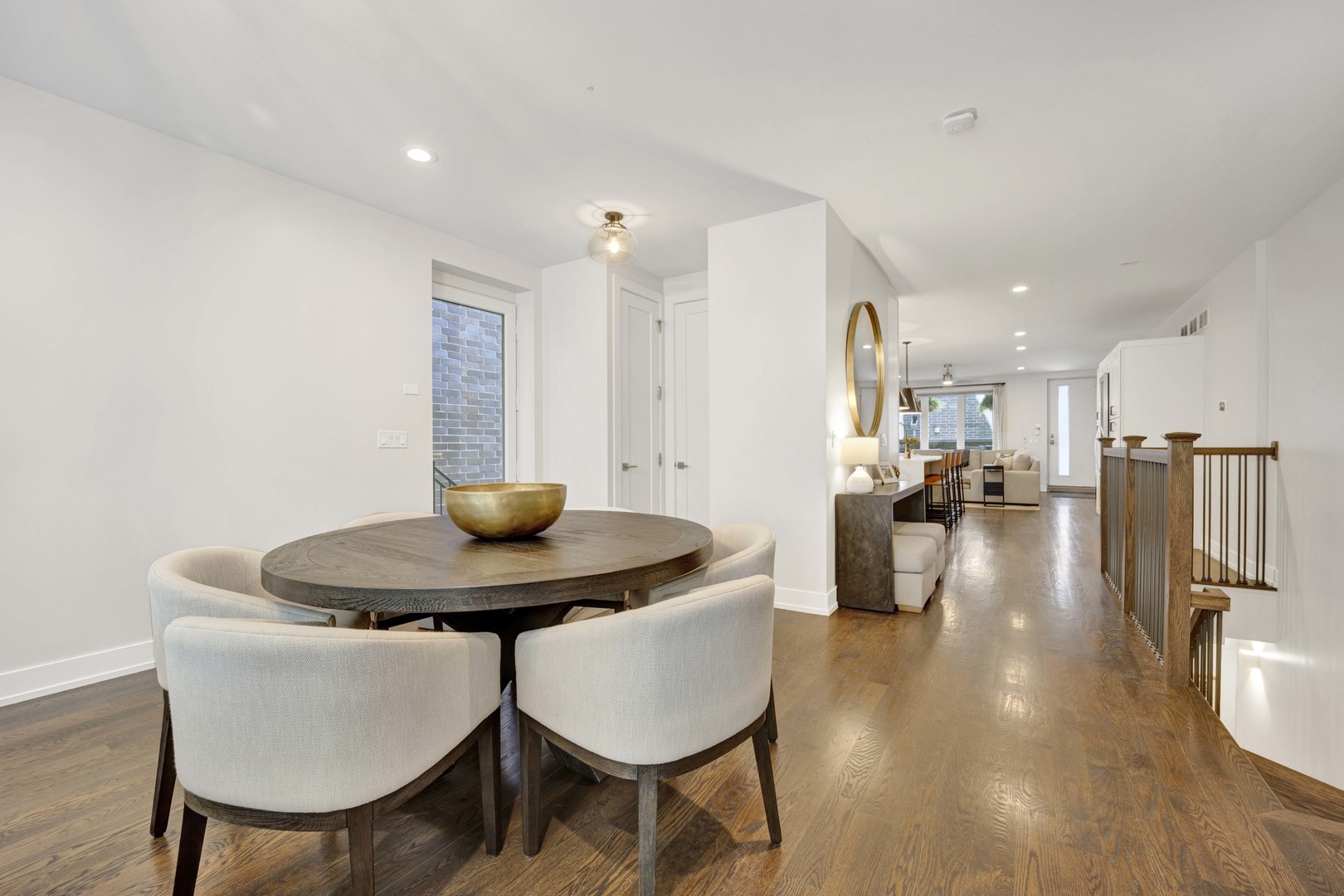 2140 West Rice Street, Unit 1W Chicago, IL 60622 - Photo 7 of 25 a view of a dining room with furniture and wooden floor