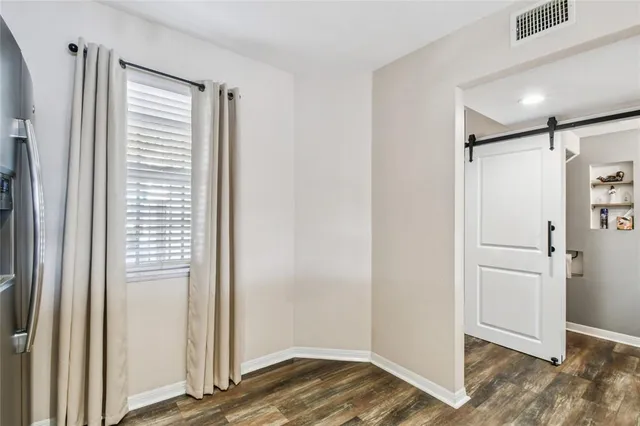 a front view of a house with a swimming pool