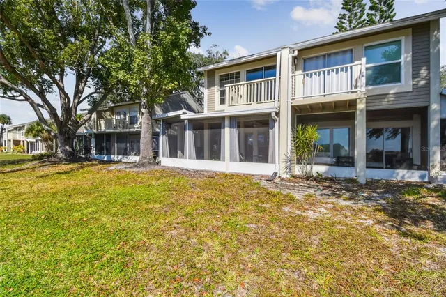 an aerial view of city and lake