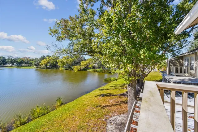 a kitchen with a sink stove and microwave