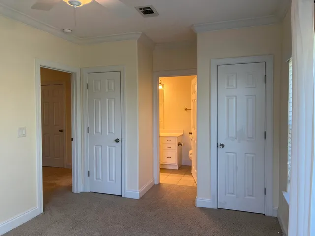a view of a bathroom with a tub and shower