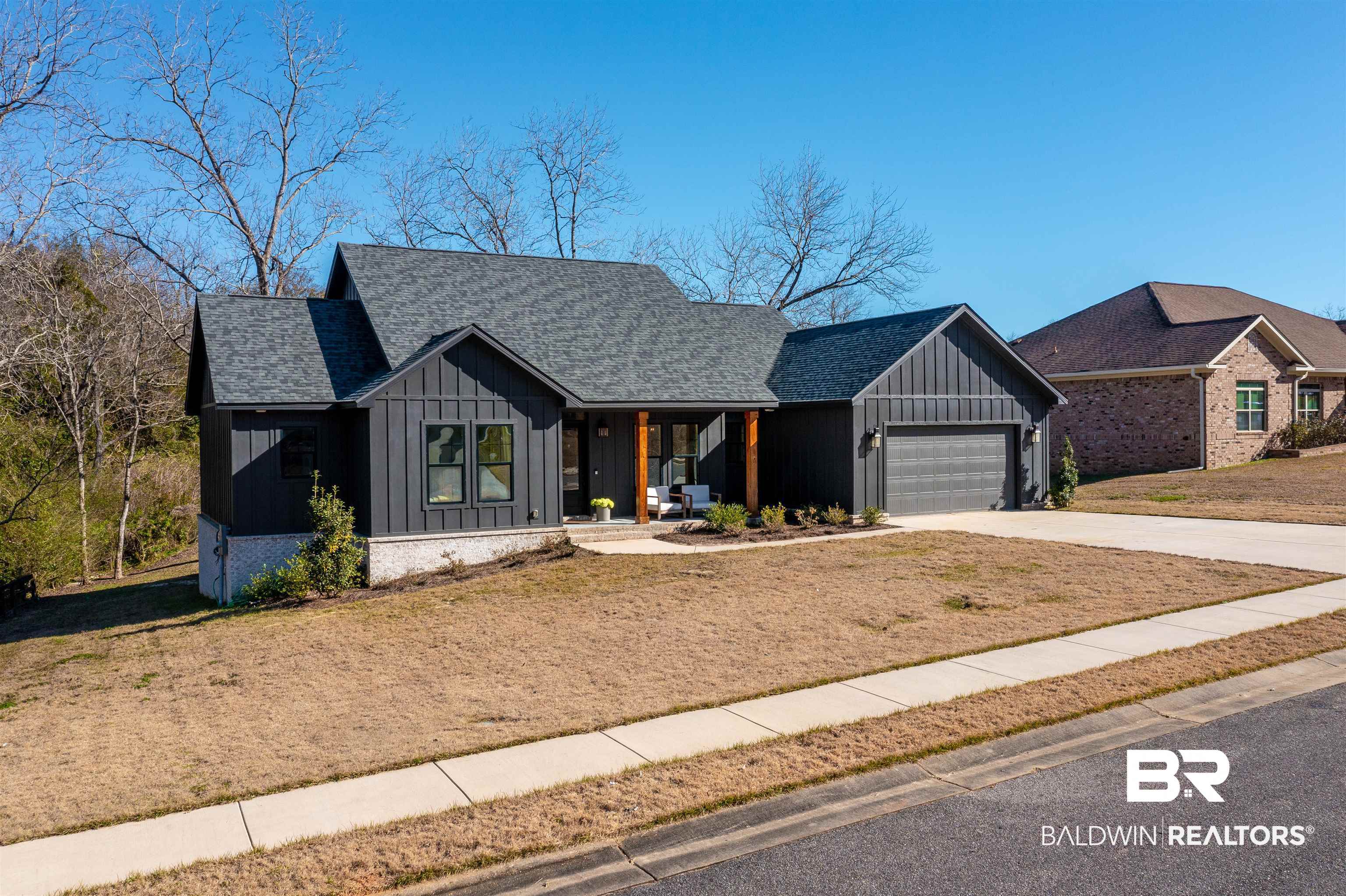 312 Pecan Ridge Boulevard Fairhope, AL 36532 - Photo 3 of 43 View of front of home with a front yard and a garage