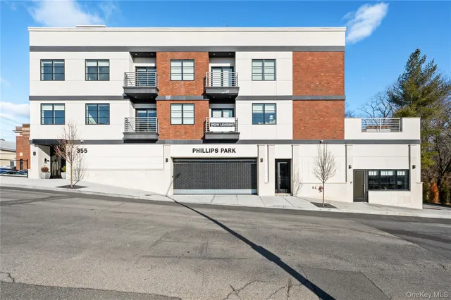a view of a building with a street