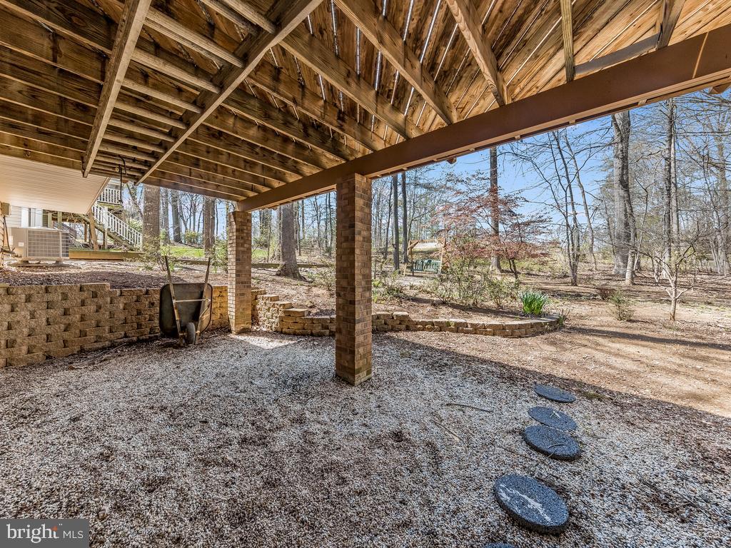 713 Gold Valley Road Locust Grove, VA 22508 - Photo 25 of 45 Gravel sitting area with shade