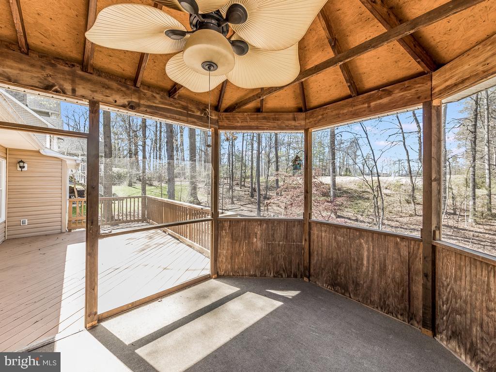 713 Gold Valley Road Locust Grove, VA 22508 - Photo 31 of 45 Enjoy a book and nature on the screened porch