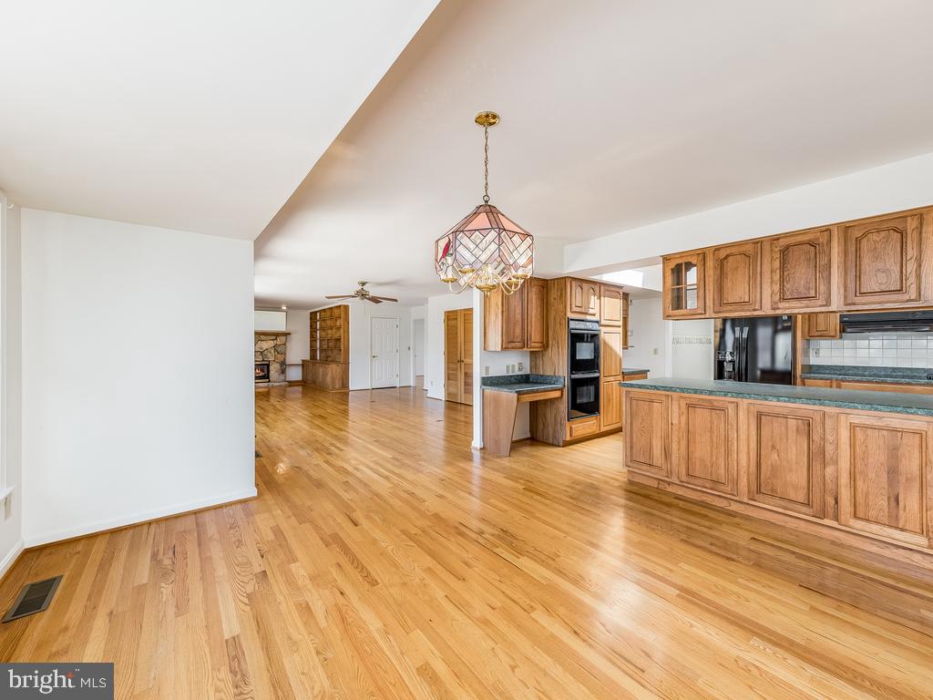 713 Gold Valley Road Locust Grove, VA 22508 - Photo 6 of 45 Gleaming hardwood floors throughout the main level