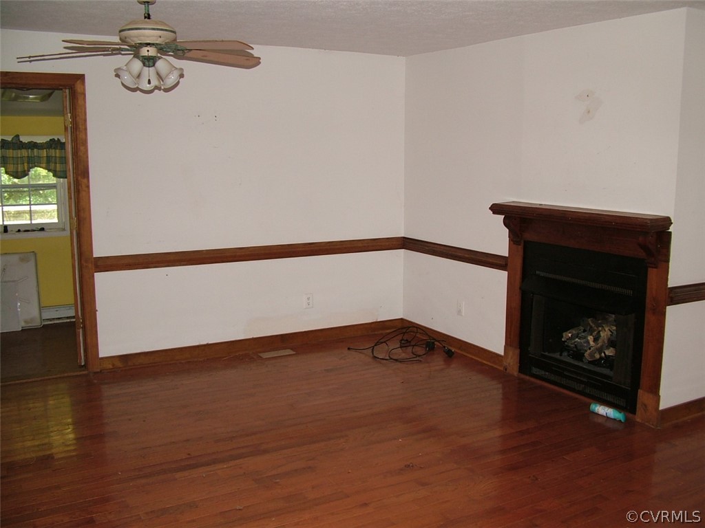 7401 Narrowridge Road Henrico, VA 23231 - Photo 12 of 23 family room with gas-log fireplace