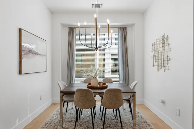a kitchen with stainless steel appliances a sink and a stove