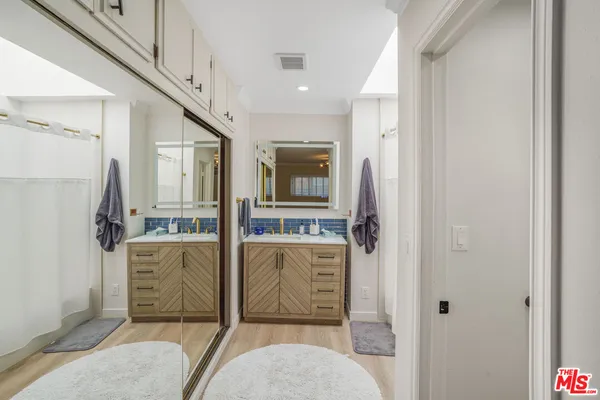 a view of a hallway with a living room