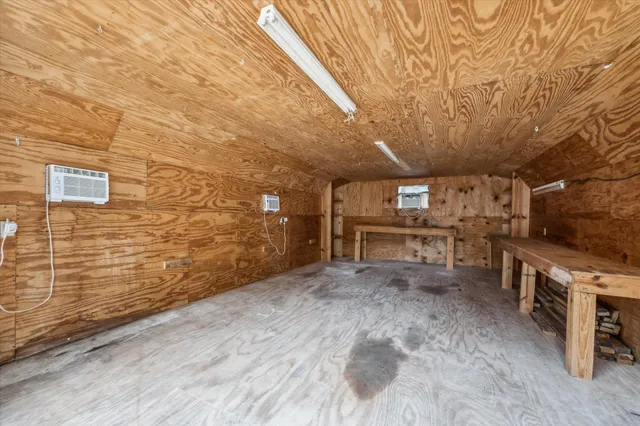 a view of backyard space and trees