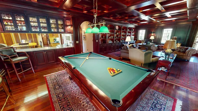 a room with furniture and wooden floor