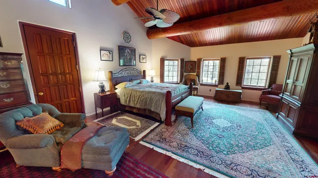 a living room with furniture rug and window