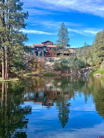 a view of a lake with a city