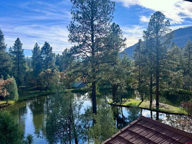 a view of a lake with a deck