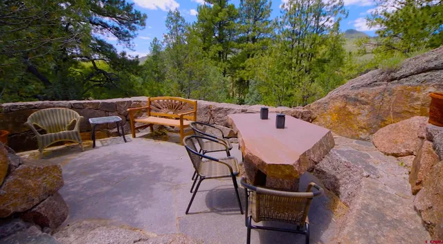 a view of a patio in backyard