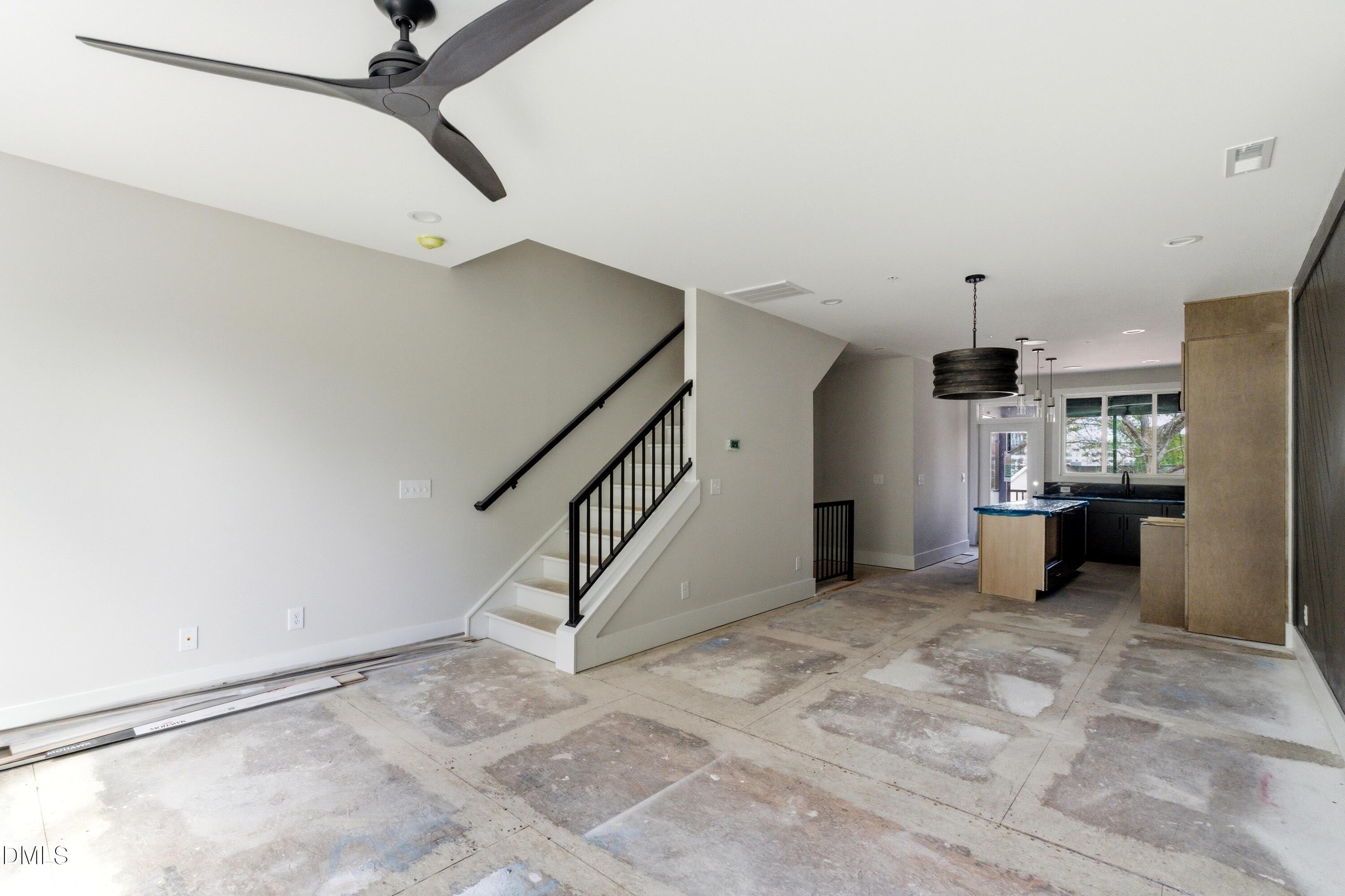 720 Noble Town Way, Unit 105 Raleigh, NC 27603 - Photo 8 of 23 The second story features all of your main living, dining and entertaining areas including a gourmet kitchen, spacious living areas, dining room, and powder room, complete with built-in bluetooth speakers in the ceilings and a second story screened-in porch