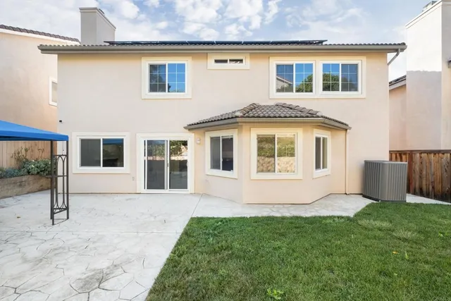 a house view with a garden space